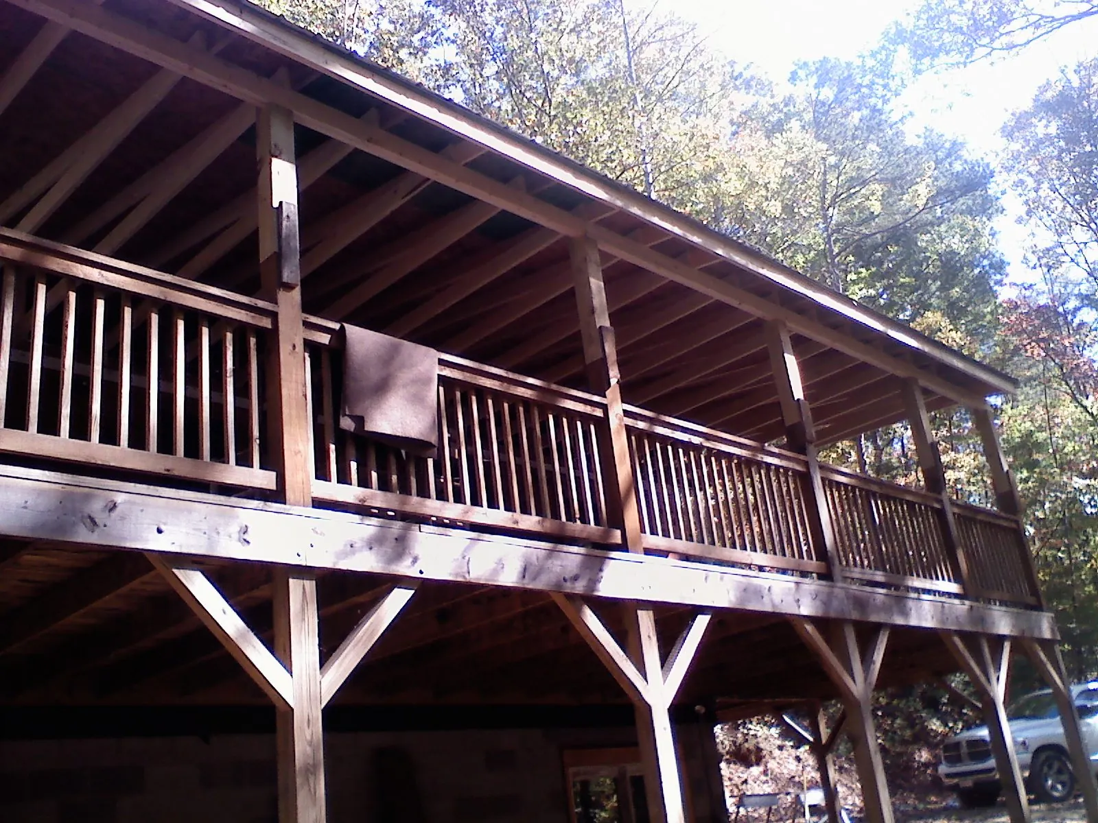 Timber framing under a new elevated porch and deck — Roof Leak Repair in Rimforest by Roofing Brothers